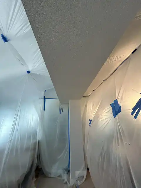 Small soffit water damage repair. Finish items protection, Demolition, drywall hanging, taping, corners application, matching existing texture and clean up. 2026 project photo